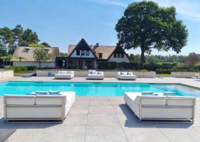 Luxury daybeds around swimming pool